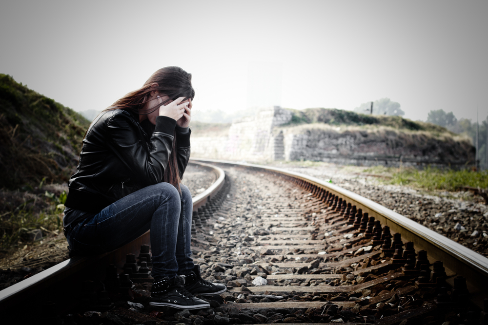 Front page girl on railway