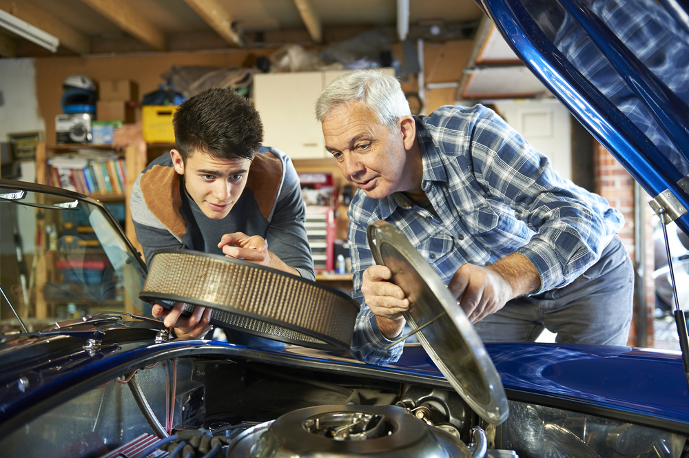 boy fixing car - Boy Fixing Car1