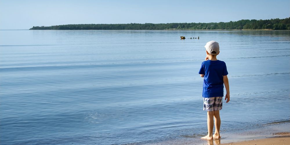 child entering the sea