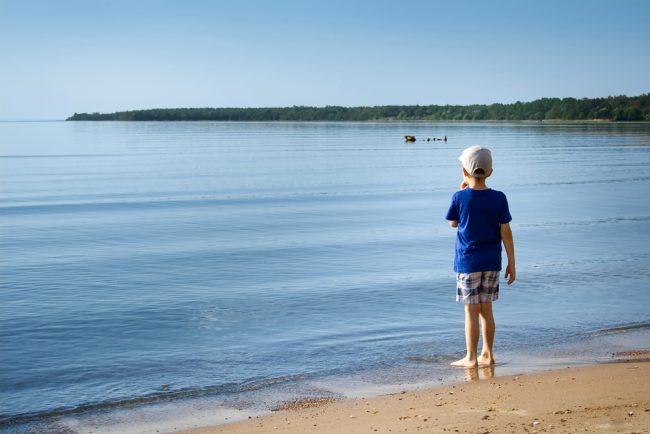 child entering the sea