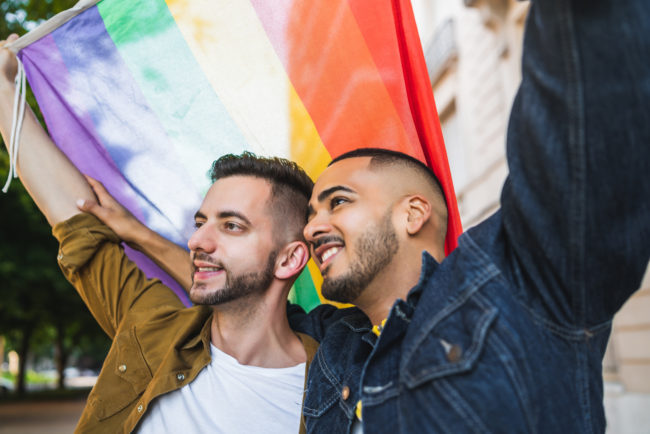 Portrait,Of,Young,Gay,Couple,Embracing,And,Showing,Their,Love