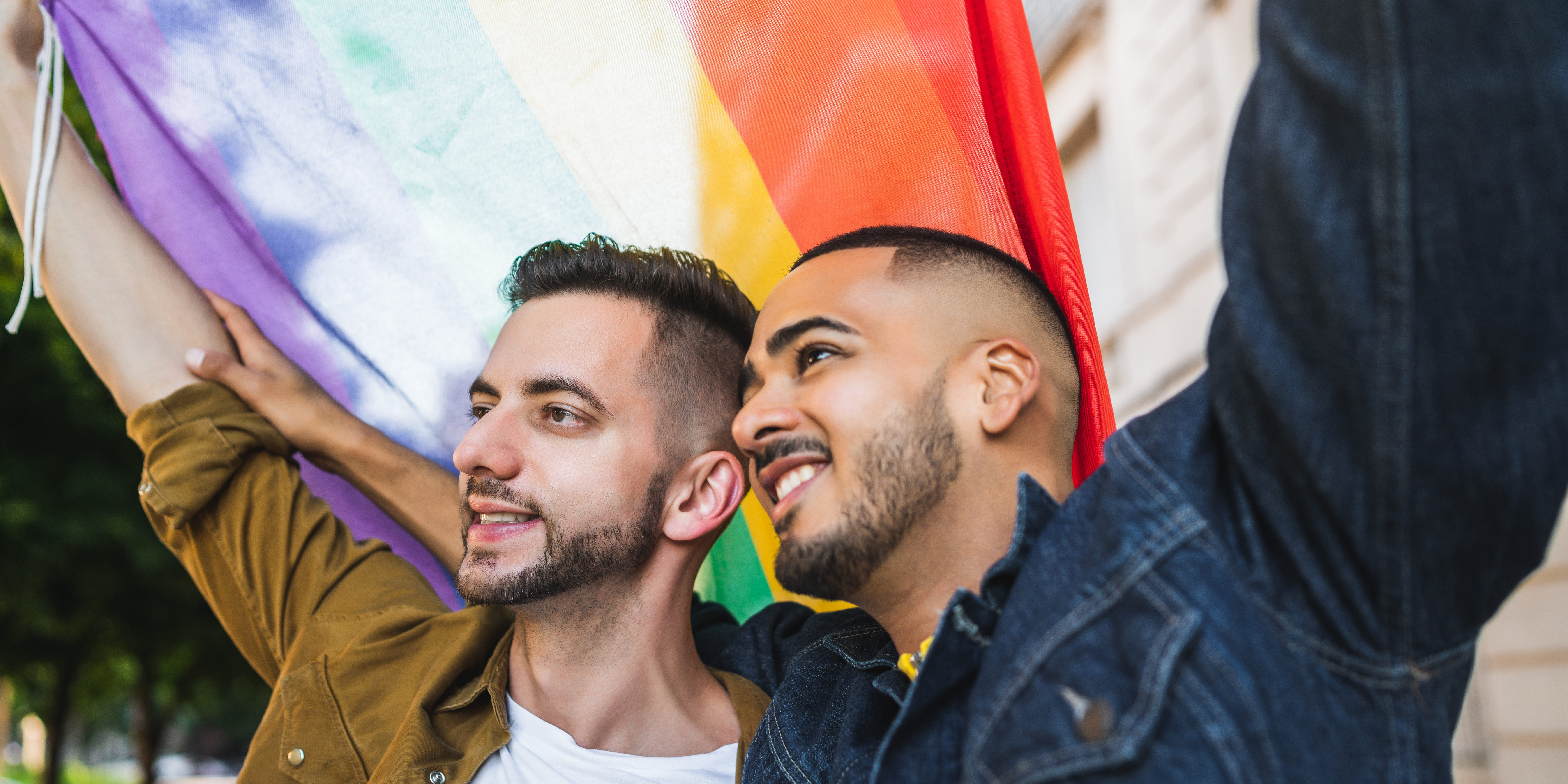 Portrait,Of,Young,Gay,Couple,Embracing,And,Showing,Their,Love