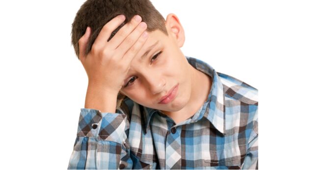 A,Closeup,Portrait,Of,A,Sad,Boy,Holding,His,Head