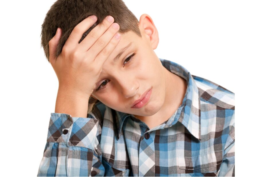 A,Closeup,Portrait,Of,A,Sad,Boy,Holding,His,Head