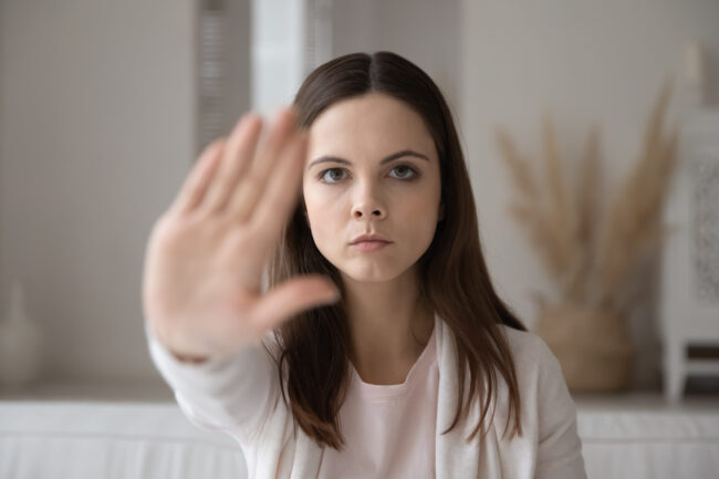 Determined,Caucasian,Young,Woman,Show,Stop,Gesture,Sign,Against,Domestic