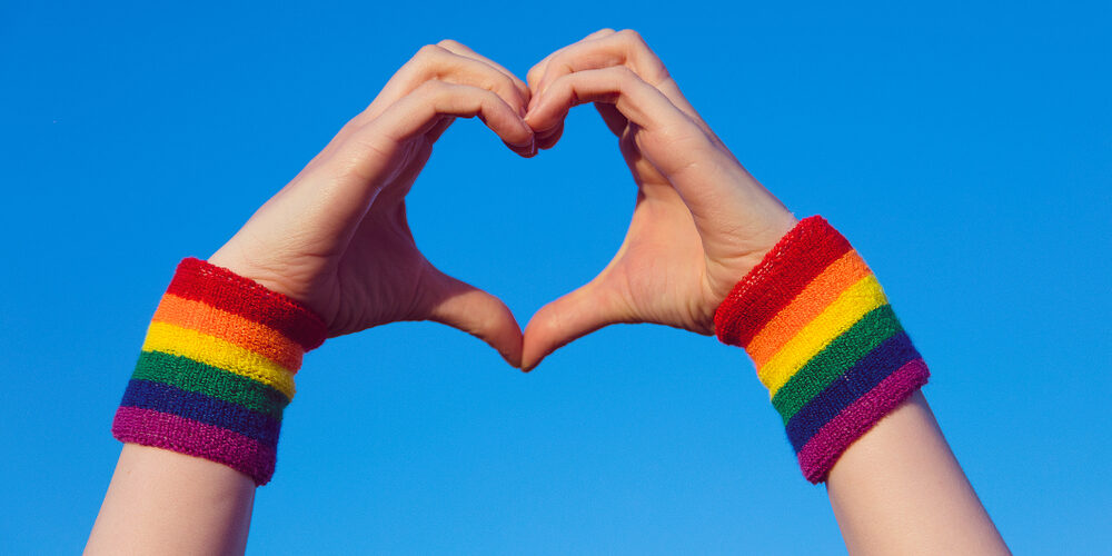 Gay,Pride,Concept.,Hand,Making,A,Heart,Sign,With,Gay