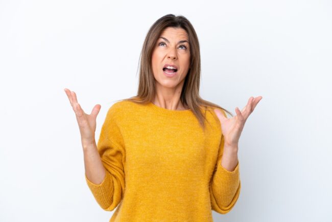 Middle,Age,Caucasian,Woman,Isolated,On,White,Background,Stressed,Overwhelmed